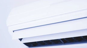 Picture of a small air conditioning unit - a split unit used in small rooms and offices