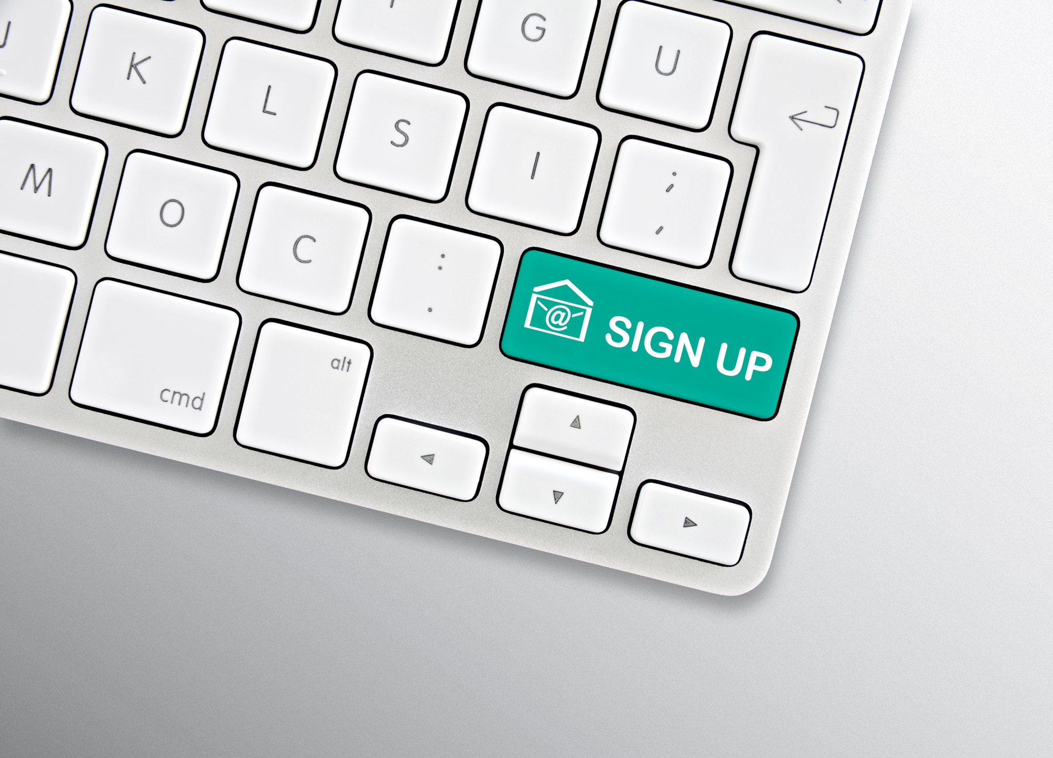 Sign up for emails icon shown on a key on a computer keyboard
