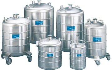 A collection of different sized dewars for storing cryogenic gases