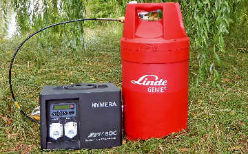 HYMERA generator and GENIE cylinder in a woodland setting 